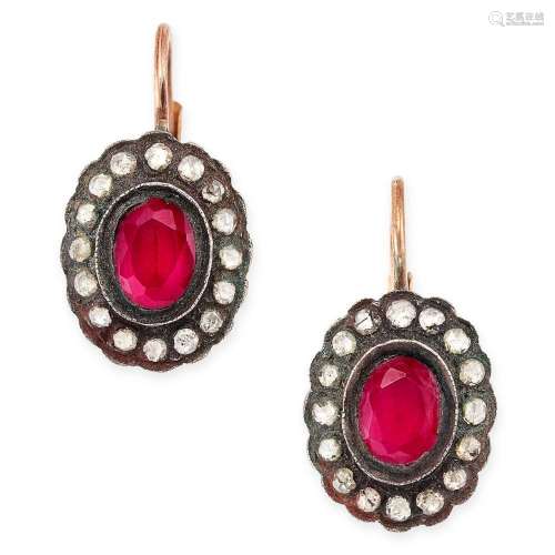 A PAIR OF RUBY AND DIAMOND CLUSTER DROP EARRINGS each set wi...