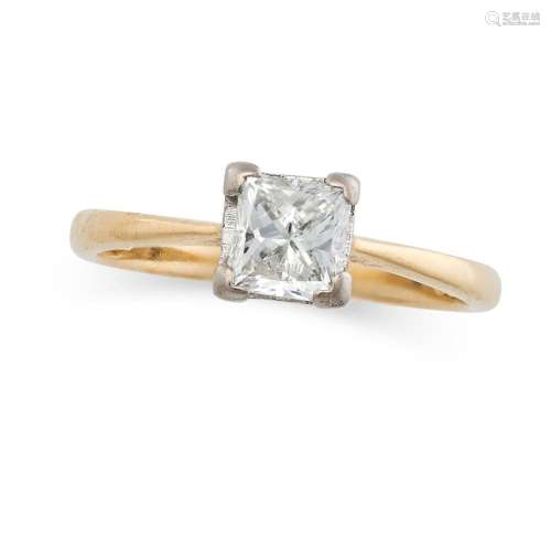 A SOLITAIRE DIAMOND RING in 18ct yellow gold, set with a pri...