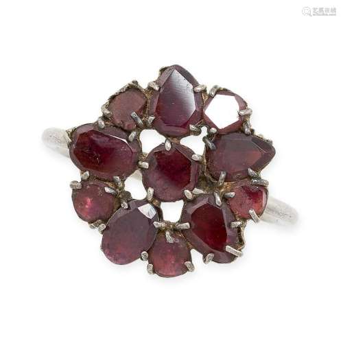 AN ANTIQUE BOHEMIAN GARNET CLUSTER RING set with a cluster o...