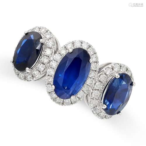 A SAPPHIRE AND DIAMOND CLUSTER RING in 18ct white gold, set ...