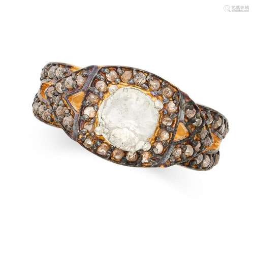 A DIAMOND RING set with a flat cut diamond, the band accente...