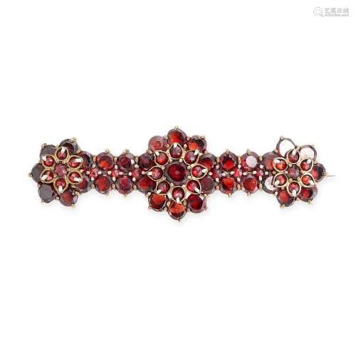 AN ANTIQUE BOHEMIAN GARNET BAR BROOCH comprising three clust...