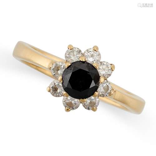 A BLACK DIAMOND AND DIAMOND CLUSTER RING in 18ct yellow gold...