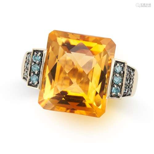 A CITRINE AND BLUE DIAMOND RING in 14ct yellow gold, set wit...