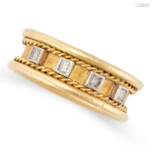 A DIAMOND DRESS RING in 18ct yellow gold, set with four prin...