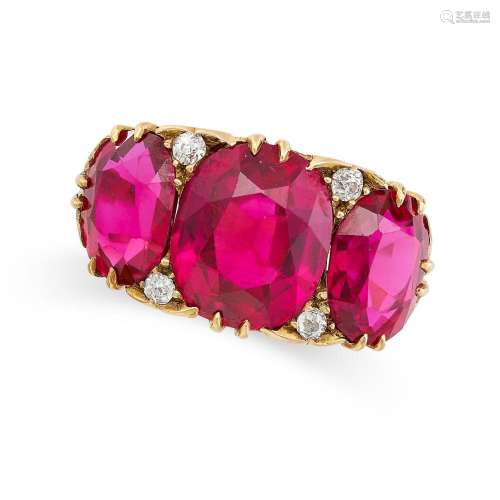 A SYNTHETIC RUBY AND DIAMOND RING in 18ct yellow gold, set w...
