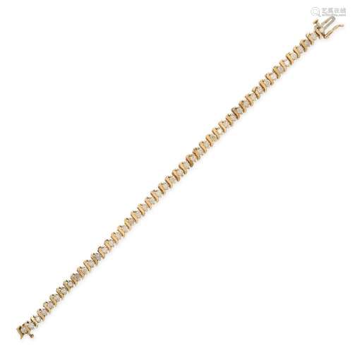 A DIAMOND BRACELET in 9ct yellow gold, set with a row of rou...