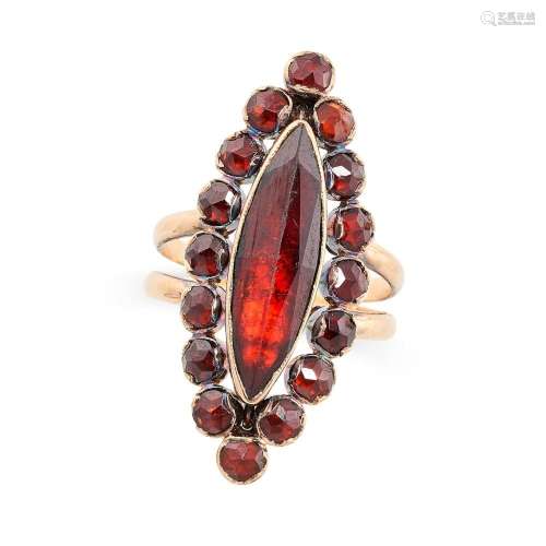 AN ANTIQUE GARNET NAVETTE RING in rose gold, set with a marq...