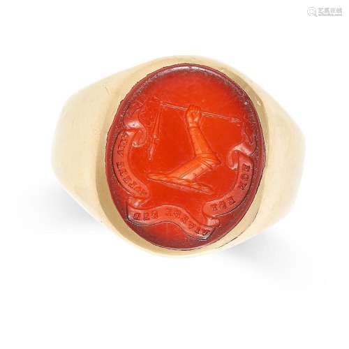 A VINTAGE CARNELIAN SIGNET RING in yellow gold, set with a c...