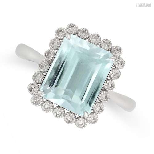 AN AQUAMARINE AND DIAMOND CLUSTER RING in 18ct white gold, s...
