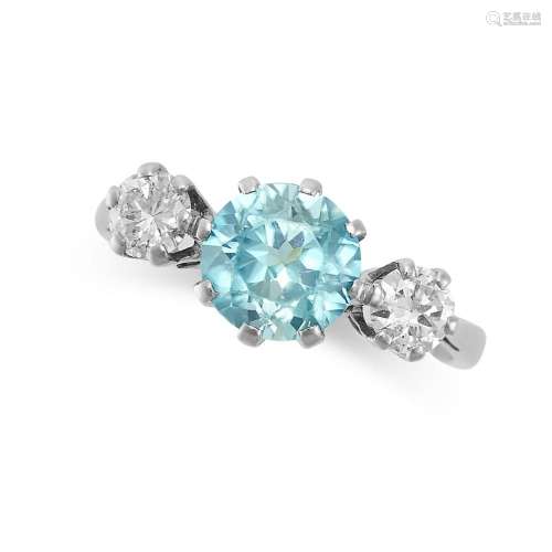 A BLUE ZIRCON AND DIAMOND THREE STONE RING set with a round ...