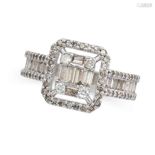 A DIAMOND DRESS RING in 14ct white gold, the face illusion s...