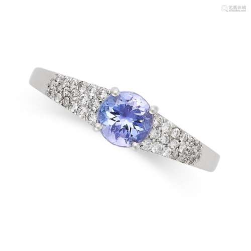 A TANZANITE AND DIAMOND RING in 14ct white gold, set with a ...