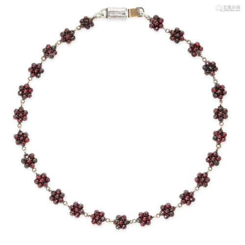 AN ANTIQUE GARNET CLUSTER NECKLACE set with a row of twenty ...