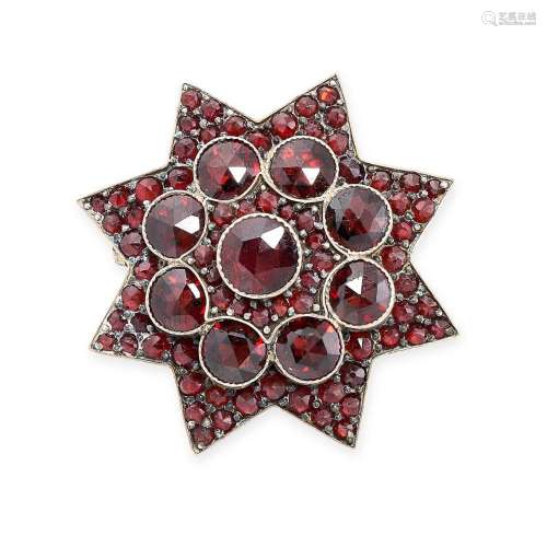 AN ANTIQUE BOHEMIAN GARNET STAR BROOCH designed as an eight ...