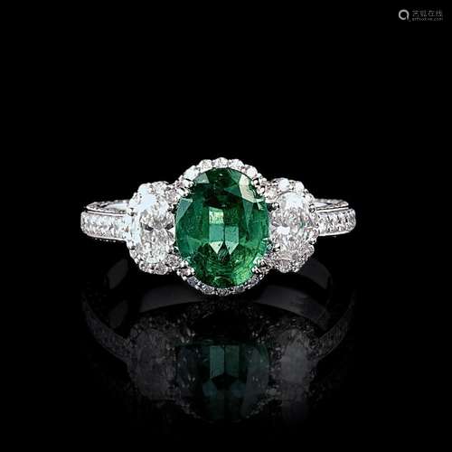 An Emerald Diamond Ring.