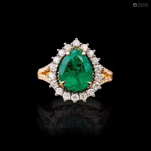 An Emerald Diamond Ring.