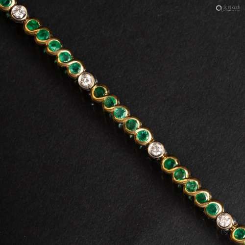 An Emerald Diamond Bracelet.