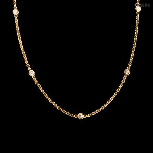 A petite Diamond Necklace.