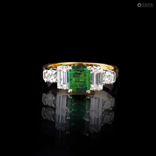 An Emerald Diamond Ring.