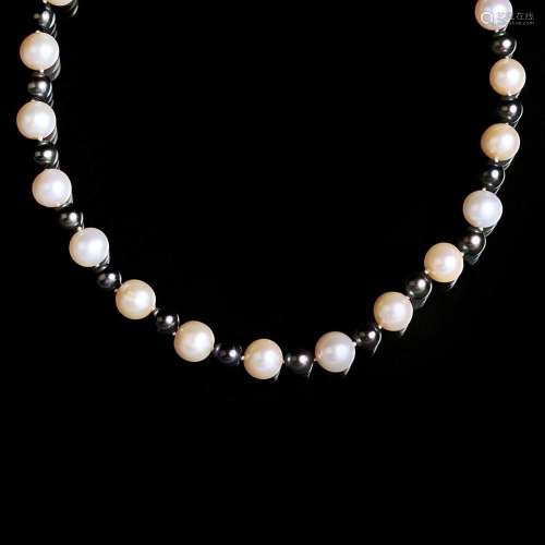 A bicolour Southsea and Tahiti Pearl Necklace.