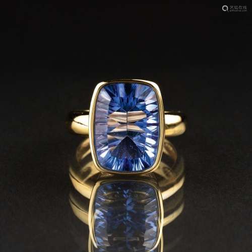 A Blue Topaz Ring.