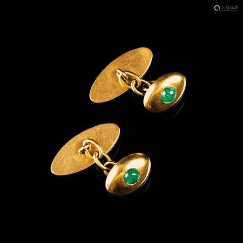 A Pair of Cufflinks with small Emeralds.