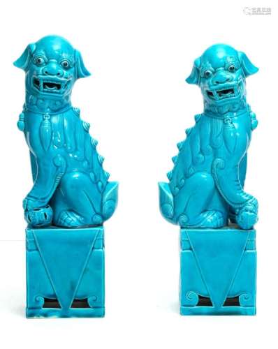 CHINESE PORCELAIN TURQUOISE FOO DOGS STANDING ON PLINTH, PAI...