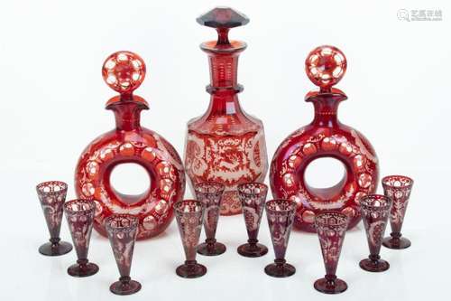 BOHEMIAN RUBY GLASS DECANTERS & CORDIAL SET, C. 1900, 13...