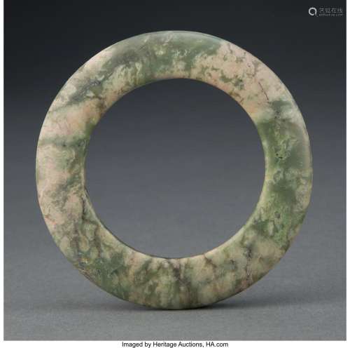 A Chinese Archaic Jade Ring 3-1/2 x 3-1/2 x 0-1/2 inches (8....