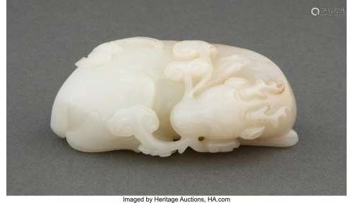 A Chinese Carved White and Russet Jade Deer, Qing Dynasty, 1...