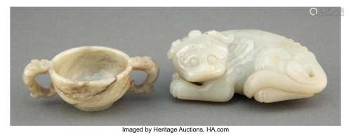 A Chinese Carved Celadon Jade Cup and Buddhist Lion, Ming Dy...