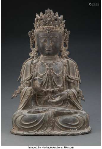 A Chinese Bronze Guanyin, Ming Dynasty 12-1/2 x 8-1/8 x 5-1/...