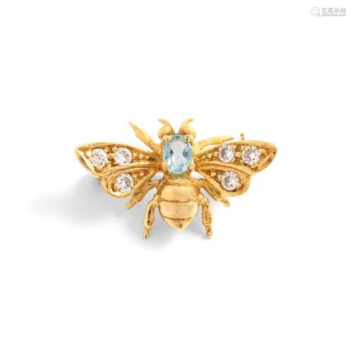 Broche en or jaune 18K 750‰, en forme de mouche, sertie d’un...