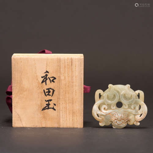 A CARVED JADE PLAQUE WITH JAPANESE BOX