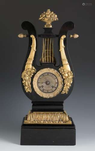 Empire lyre clock. France, early 19th century.Wooden structu...