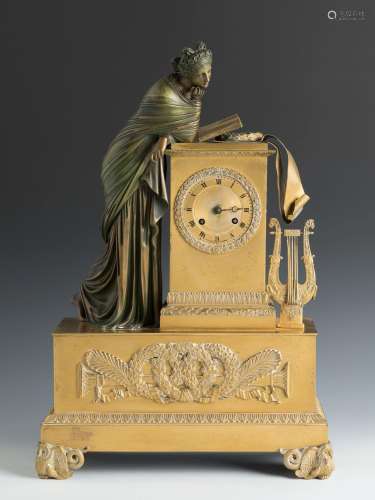 Empire table clock. France, early 19th century.Gilt bronze.T...