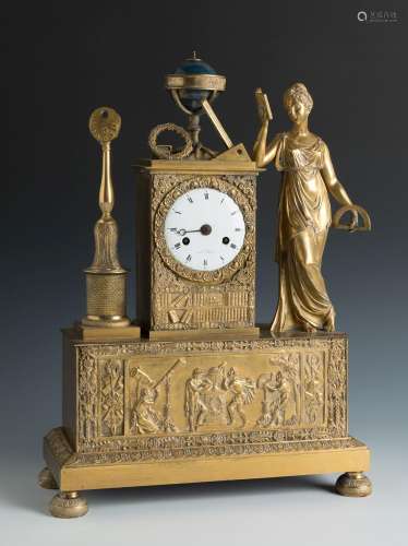 Empire table clock. France, early 19th century.Gilt bronze.T...