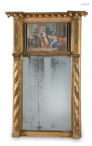 Trumeau mirror. France, 18th century.Carved and gilded wood....