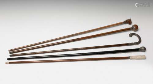 A set of five canes, late 19th-early 20th century. Various m...