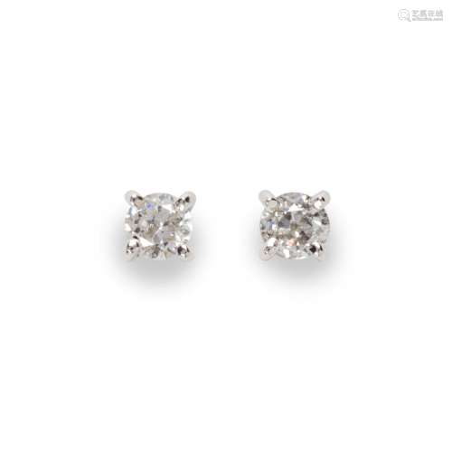 A pair of diamond and eighteen karat white gold earrings