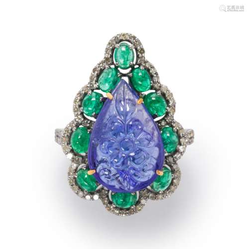 A tanzanite, emerald and diamond ring