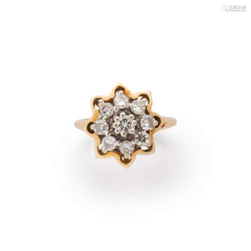 A diamond and fourteen karat gold ring