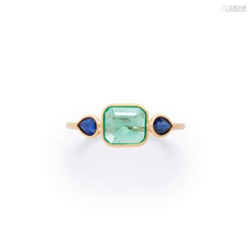 An emerald, sapphire and eighteen karat gold ring
