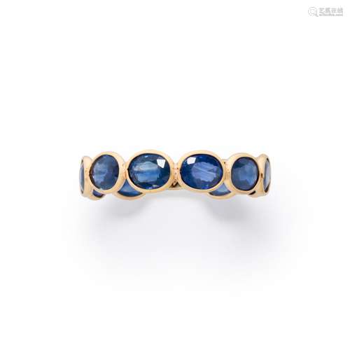 A sapphire and eighteen karat gold ring