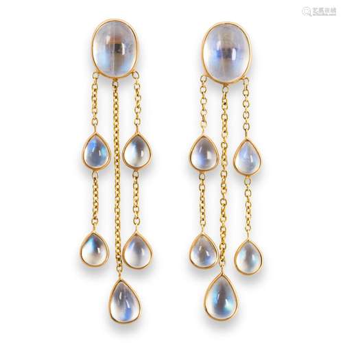 A pair of moonstone and eighteen karat gold earrings