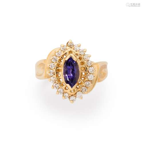 A tanzanite, diamond and fourteen karat gold ring