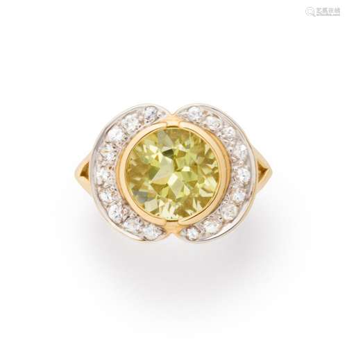 A citrine, white sapphire and fourteen karat bi-color gold r...