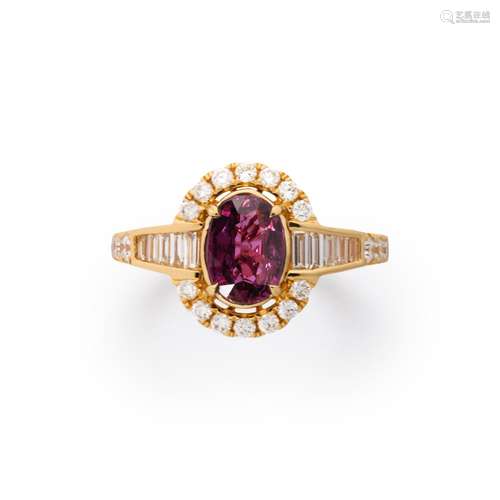 A ruby diamond and fourteen karat gold ring