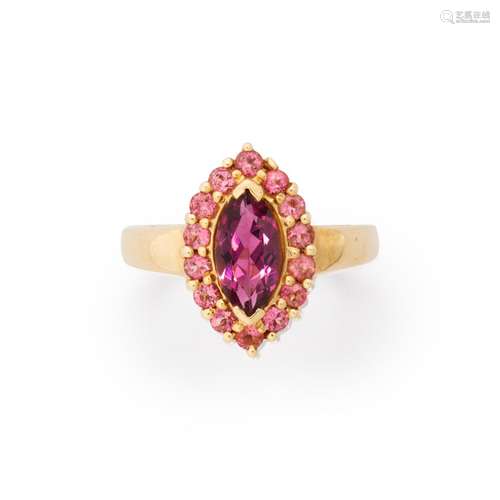 A pink tourmaline and fourteen karat gold ring